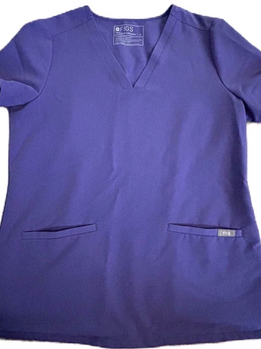 FIGS Casma Three-Pocket
Scrub Top Size Medium Purple PO# 3129